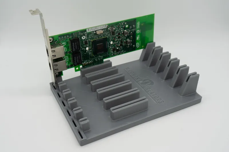 3D-printed PCIe card holder with Machine Creators branding