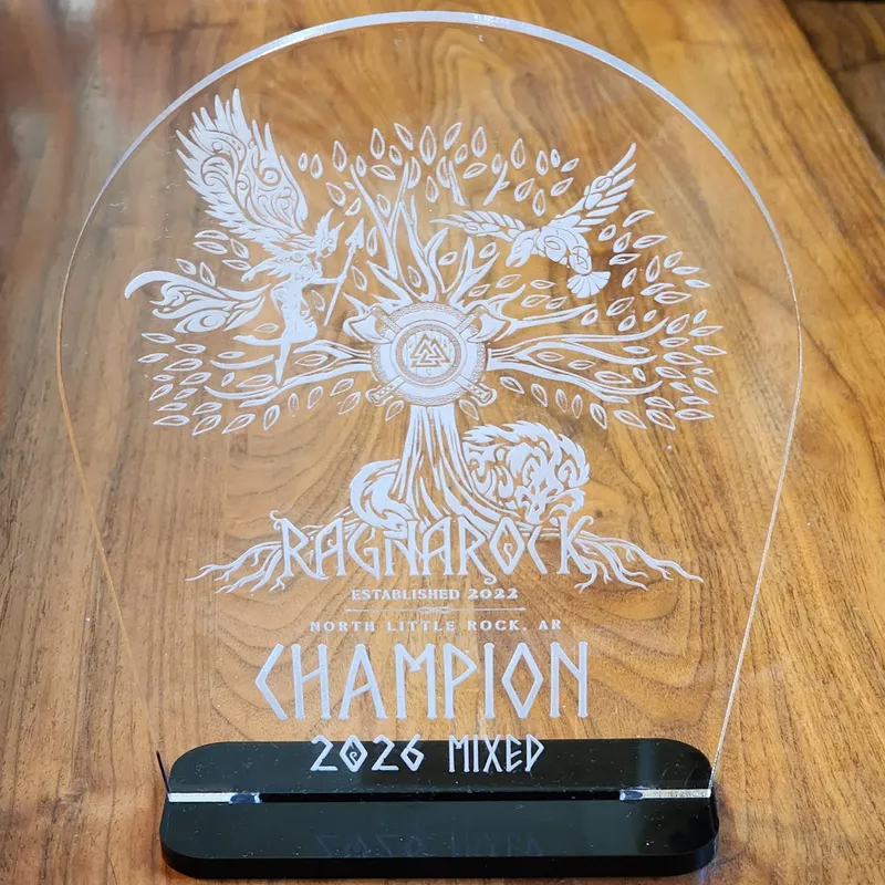 RagnaRock 2026 Mixed Champion trophy — laser-engraved clear acrylic with Yggdrasil tree design